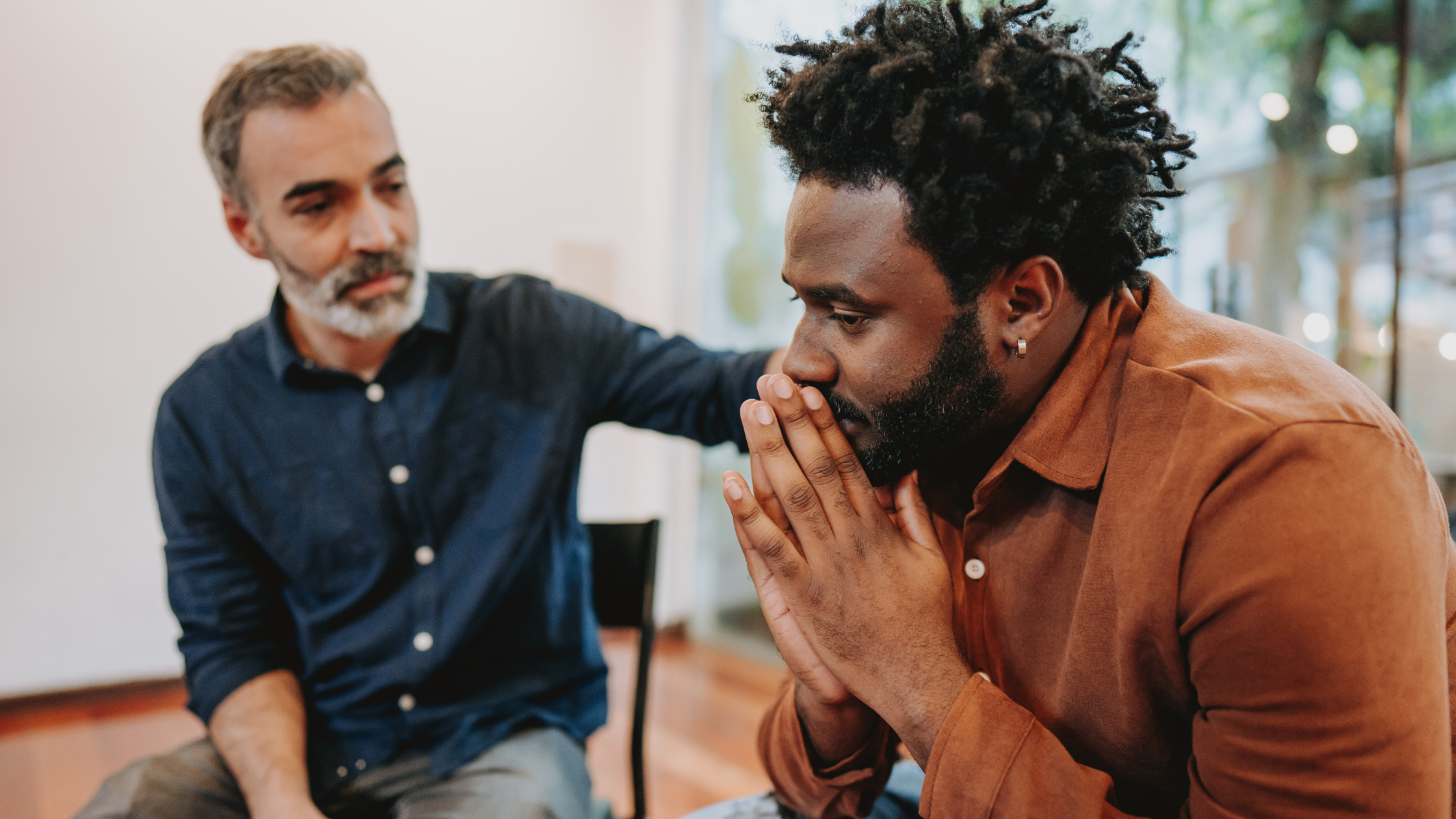 people in a support group. people in a support group.